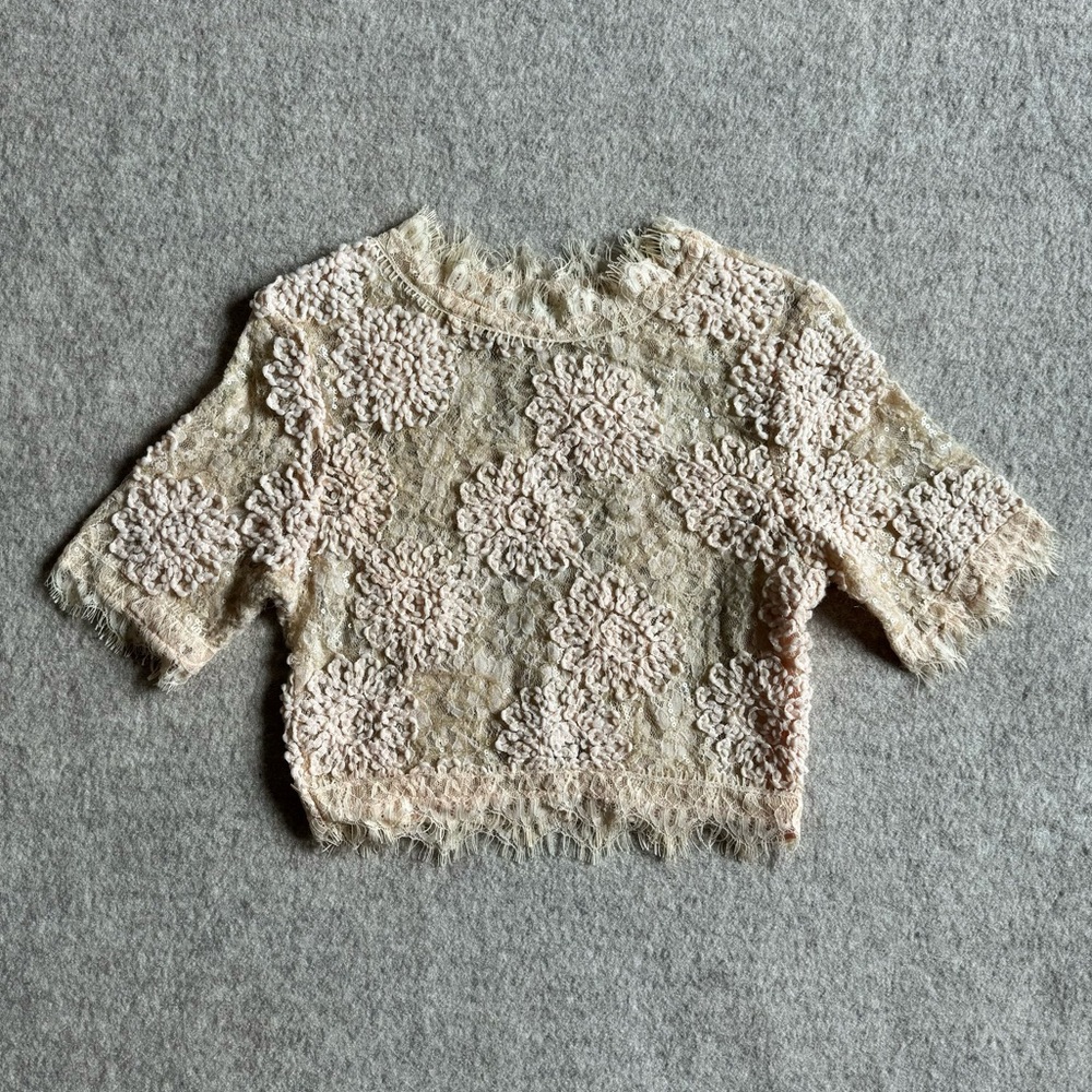 A. Peach cream lace top